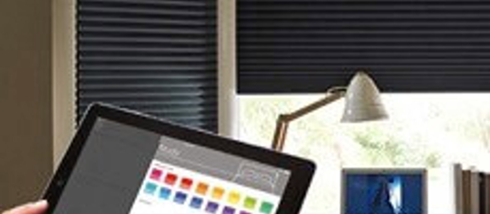 Person on a tablet selecting Duette blind colours